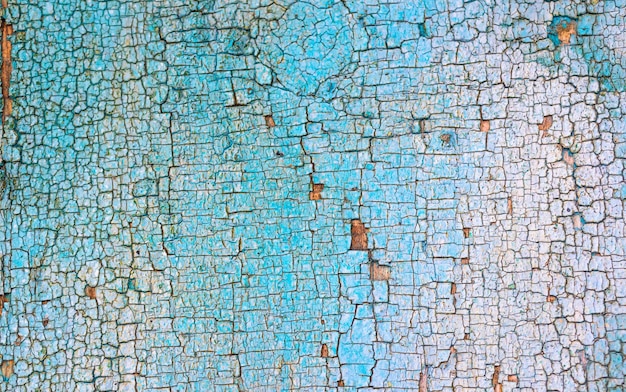 Old wood texture with colorful cracked paint Retro and vintage high detailed background closeup view photo