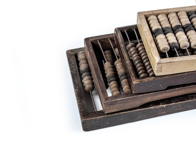 Old wooden abacus on white background