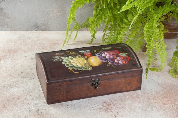 Old wooden box on a concrete table