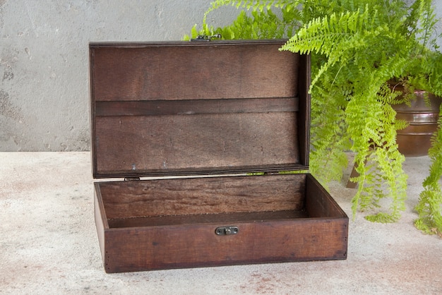 Old wooden box on a concrete table