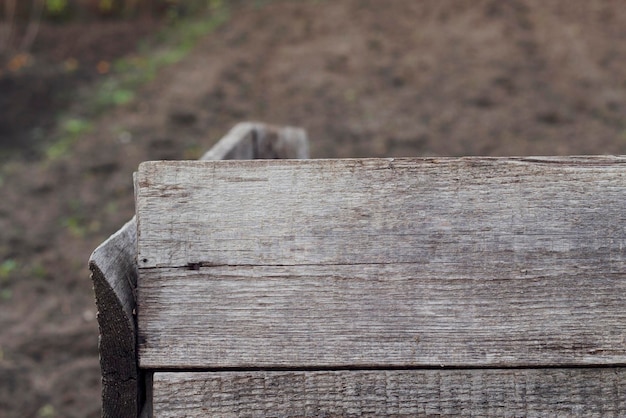 old wooden box plank in the garden as an empty background