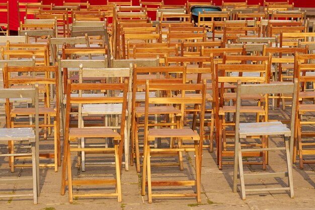 Old wooden chairs outside as a background