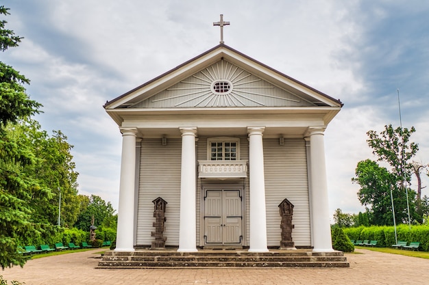 Old Wooden Church at Sunset Clouds