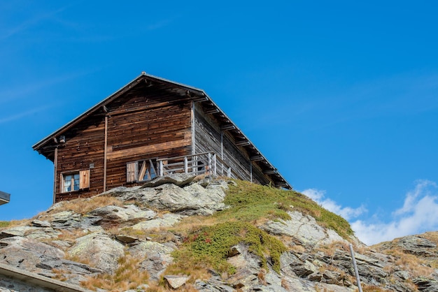 Old wooden cottage at bernina pass