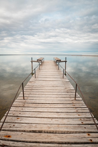 Old wooden dock on lake