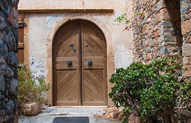 Old wooden door in an ancient building