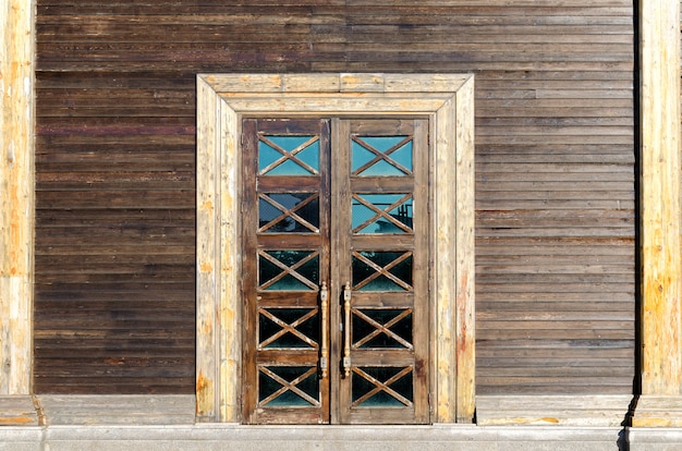 Old wooden door with glass inserts