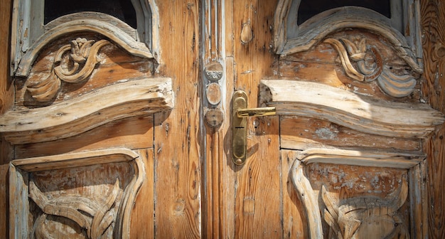 Old wooden door with a handle