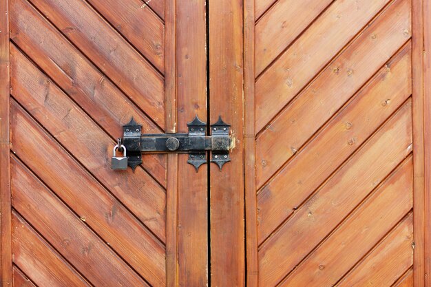 Photo old wooden door with lock