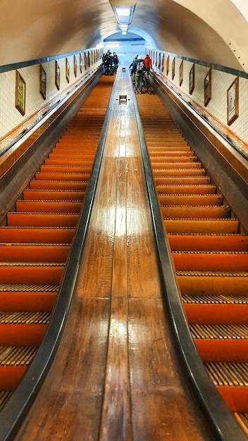 Old wooden escalator in a pedestrian tunnel