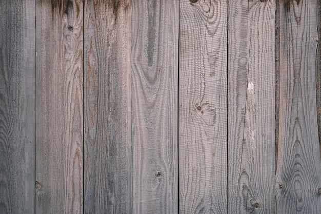 Photo old wooden fence background texture close up. high quality photo