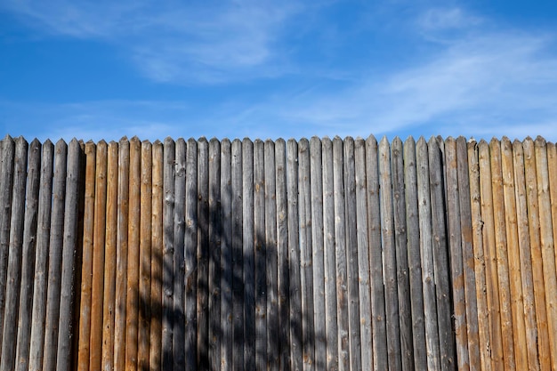 An old wooden fence in the countryside