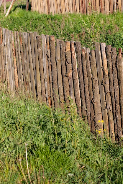 An old wooden fence in the countryside