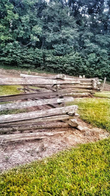 Photo old wooden fence on field