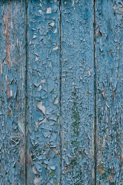 Old wooden fence with peeling paint