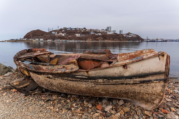 Premium Photo  Old wooden fishing boat on a dry lake Autumn