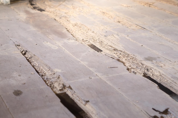 Old wooden floor and room in abandened old house destroyed by termites background texture concept