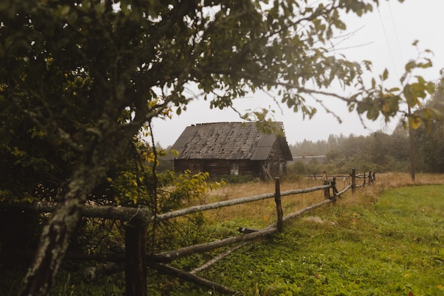 Old wooden house in the countryside in eastern europe