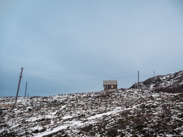 An old wooden hunting lodge on the polar hill