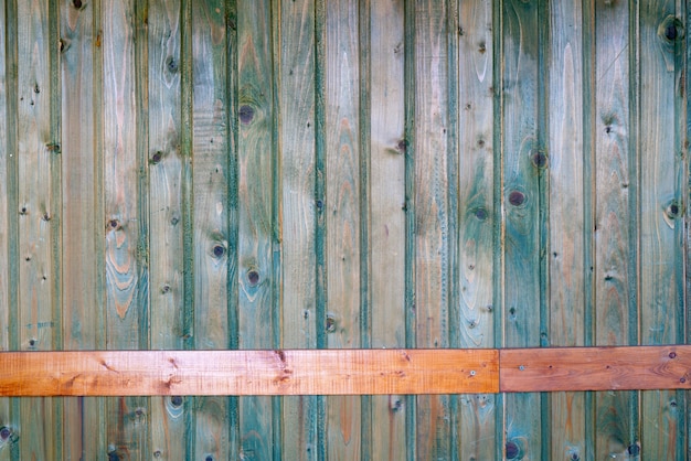 Old wooden planks with peeling paint. Vintage wood texture.