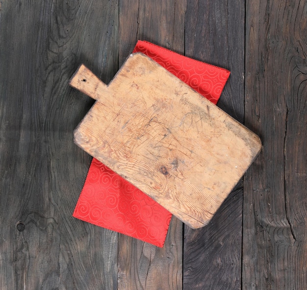 old wooden plate on blue rustic wooden background