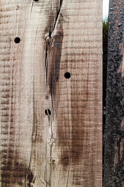 Old wooden texture with holes and cracks