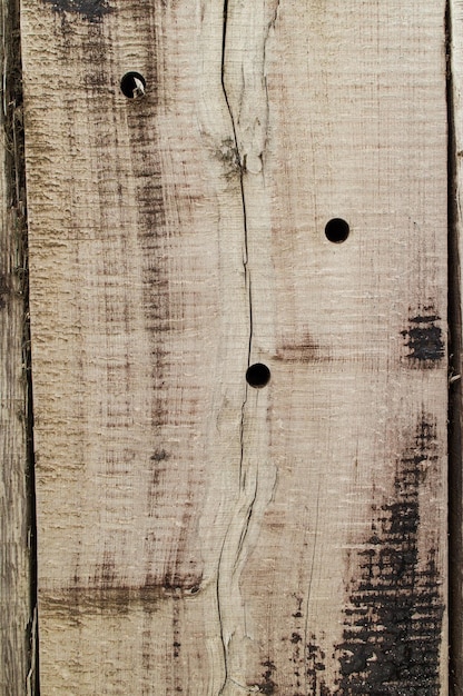 Старая деревянная текстура с отверстиями и трещинами
