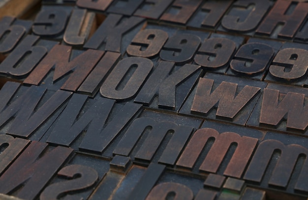 Old wooden vintage offset typography letterpress printing blocks