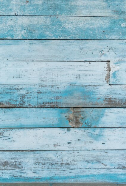 old wooden wall with faded paint