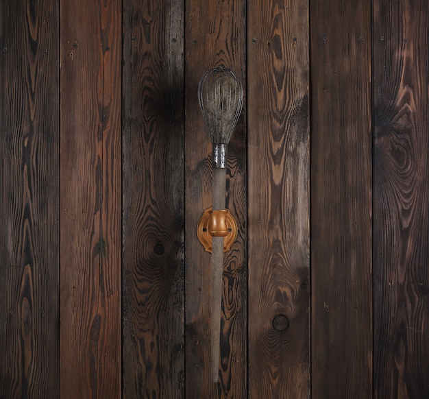 old wooden wall with torches