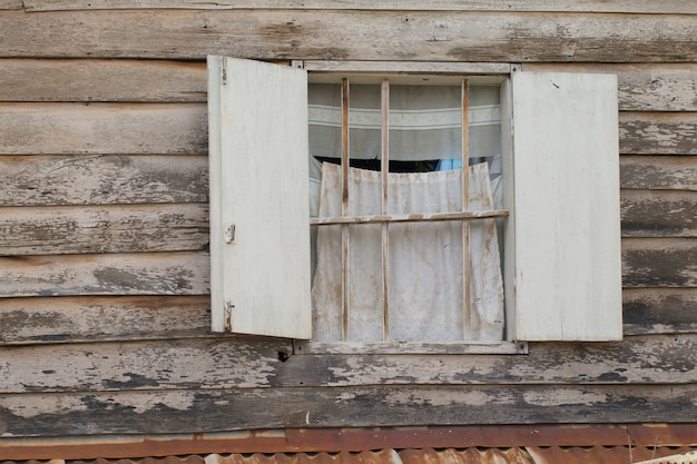 Old wooden wall with window