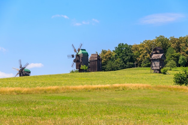 Old wooden windmills in Pyrohiv Pirogovo village near Kiev Ukraine