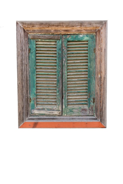 Old wooden window with closed green attice shutters Vertical Isolated on a white background