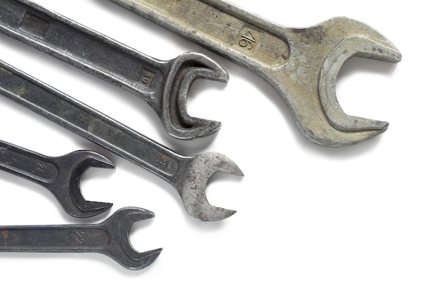 Old wrenches on white
