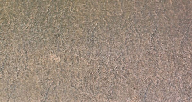 old wrinkled brown upholstery leather