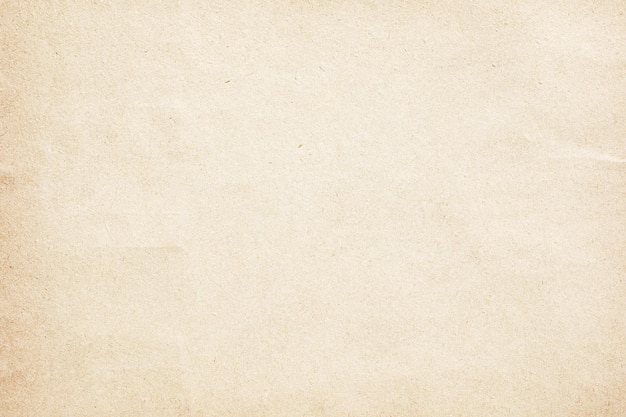 Photo old yellowed kraft paper surface background texture