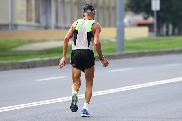 Older athlete runs a marathon
. sport and health