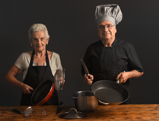 Older couple cooks