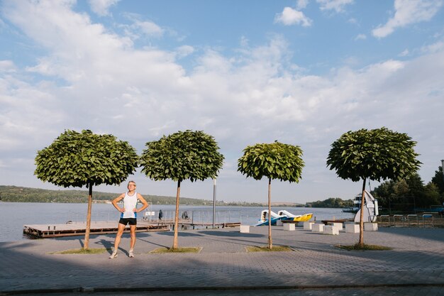 Older man is engaged in running in the fresh air. High quality photo