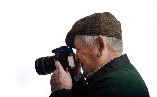 Older man taking a photo