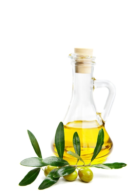 Olive oil and branch with olives on white