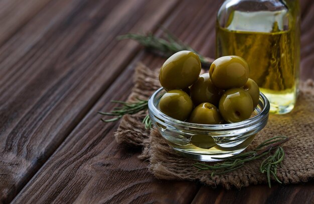 Olives and bottle of olive oil 