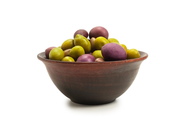 Olives in ceramic brown bowl isolated on white