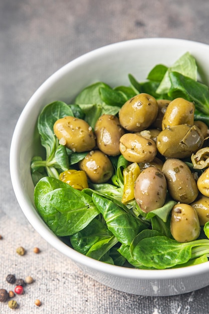 olives salad green leaf lettuce, mache corn lettuce fresh healthy meal food snack diet on the table