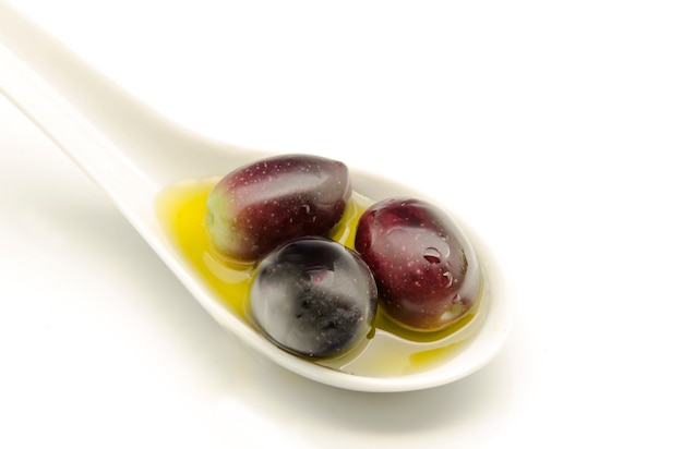 Olives on spoon