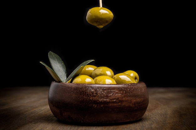 Olives with black background