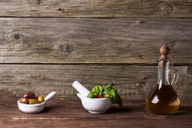 Olives with olive oil and basil