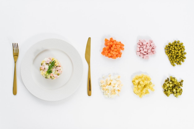 Olivier salad and ingredients for cooking 