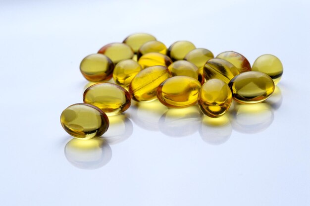 Omega 3 Fish Oil Supplement Capsules on a White Background.