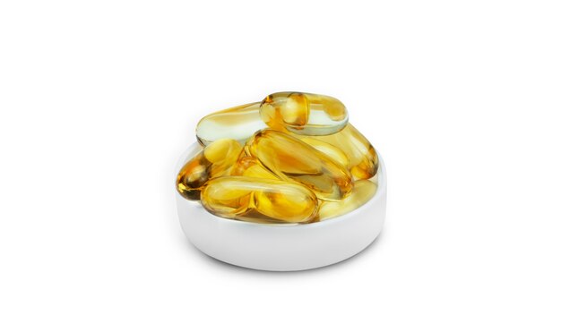 Omega capsules on white background